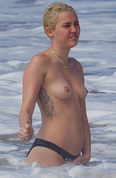 tube8 Miley Cyrus Bares Topless Breasts On Beach
